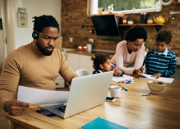 ES_Header-600x430-African-American-Black-Family-Work-From-Home-Children-Computer-Stressed