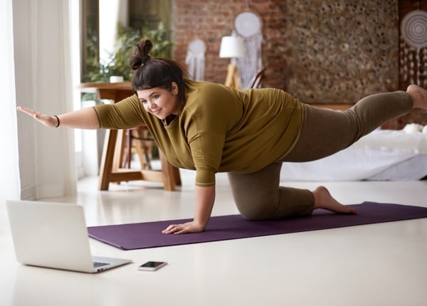 ES_Header-600x430-heavier-woman-yoga-exercise-wfh-active-physical