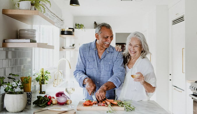 older-couple-family-relationship-cooking-healthy-meal-nutrition