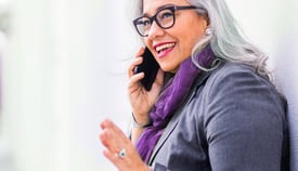 older-woman-on-phone-communication-similing