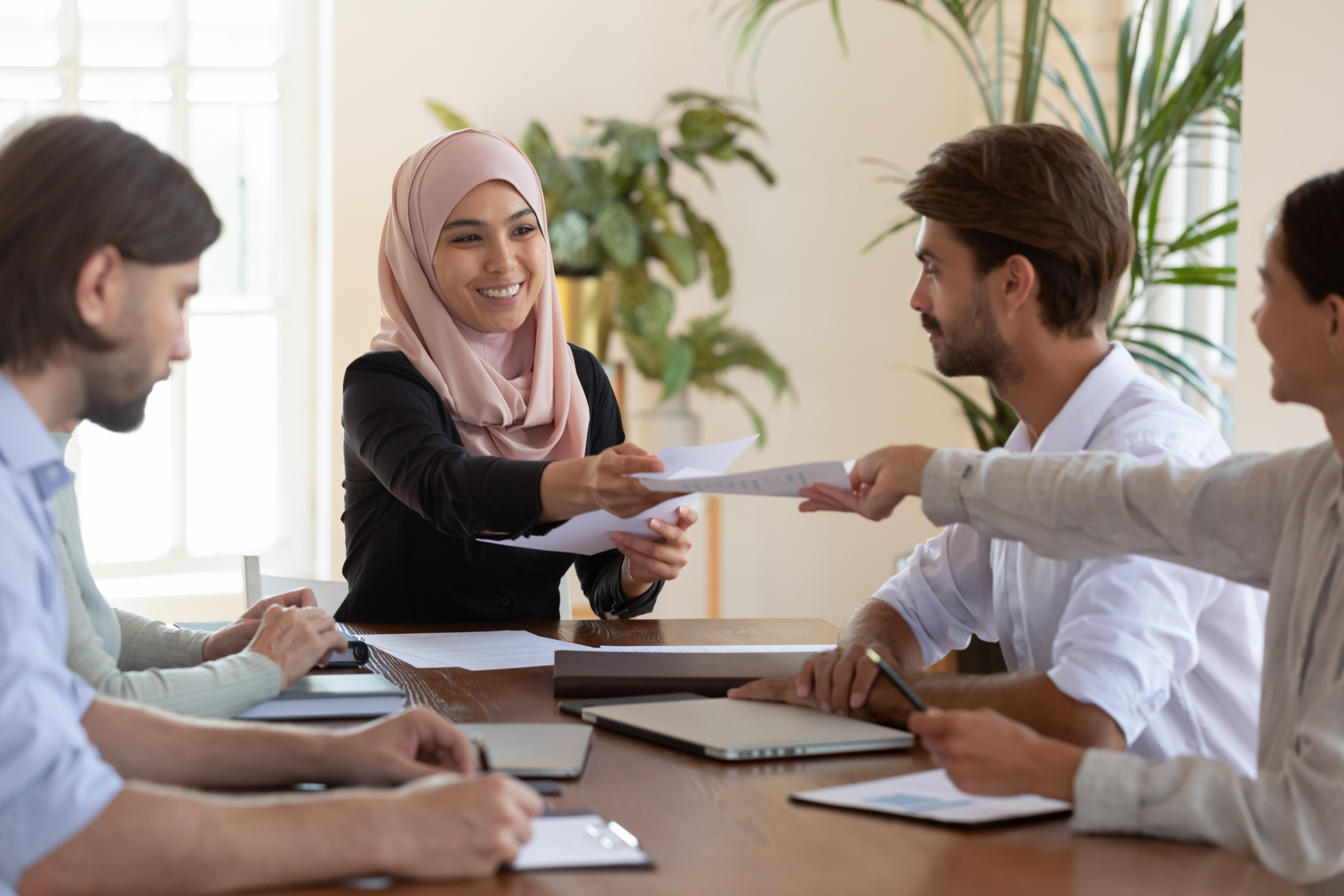 diverse-coworkers-in-meeting-hijab